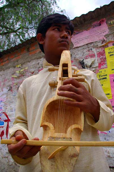 Rubin Gandharba playing sarangi