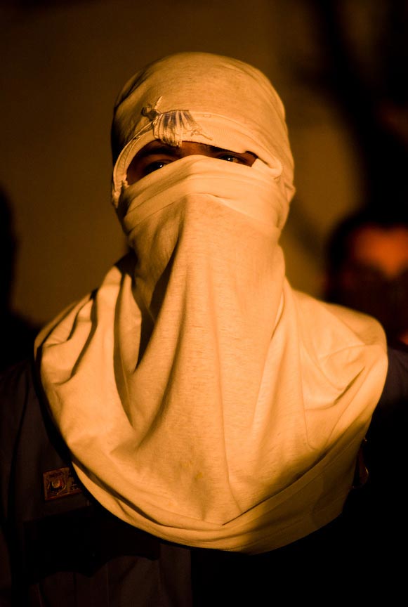 Juárez: Masked person; © Julián Cardona
