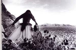 Girl in dress in desert