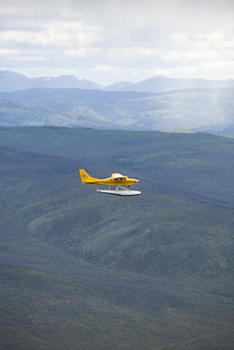 Sea plane over Yukon mountains and river