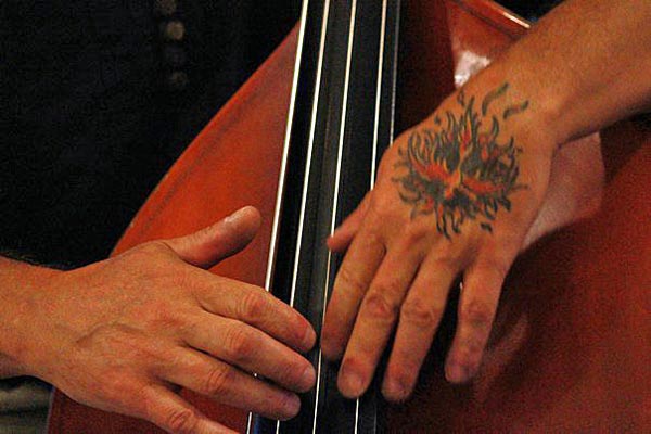 Kelly Roberti, hands, tatoo, bass