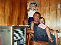 Pat Vowell with his twin daughters, Amy and Sarah