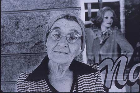 Hildie Golding photo: older woman in front of store sign