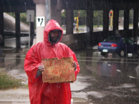 Homeles man in rain