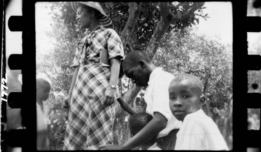 Zora Neale Hurston and three boys in Eatonville, Florida