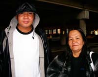 A couple shelter residents under the bridge