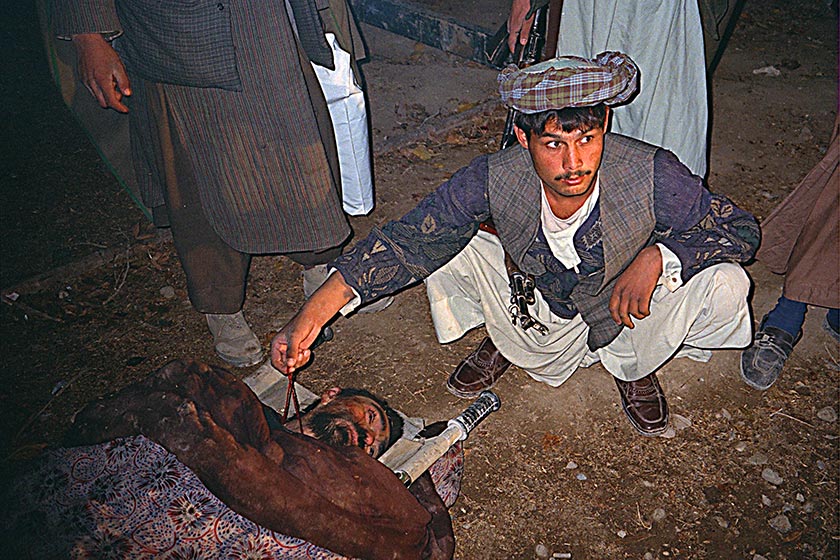 Dead man outside Qala-i-Jhangi fortress