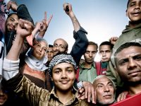 Tahrir Square protesters, rerunning to Tahrir Square, April 1, 2011, photographed by Platon