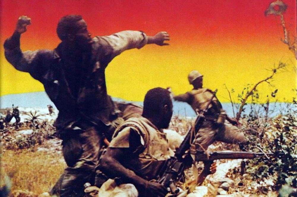 African American troops in combat in Vietnam.