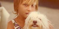 A young Kelly Kinsey with her dog, Lolly