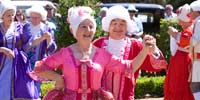 Couple in period dress dancing on Henley-on-Mersey, Bells Parade, Latrobe, Tasmania