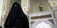 Woman in veil inside mosque