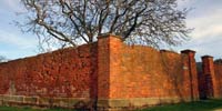 Outside prison high brick walls