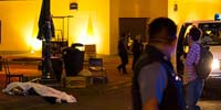 Police surround a dead body on Juarez street