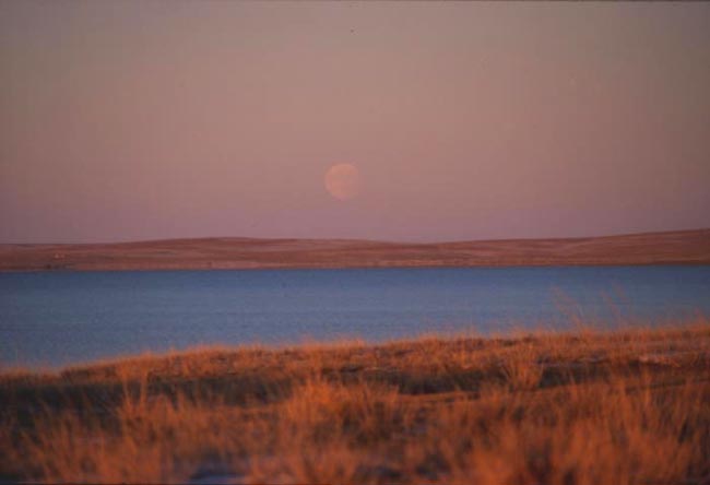 Moonrise over river