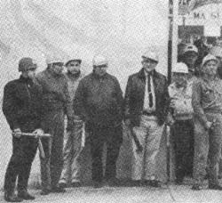 Policeman with batons